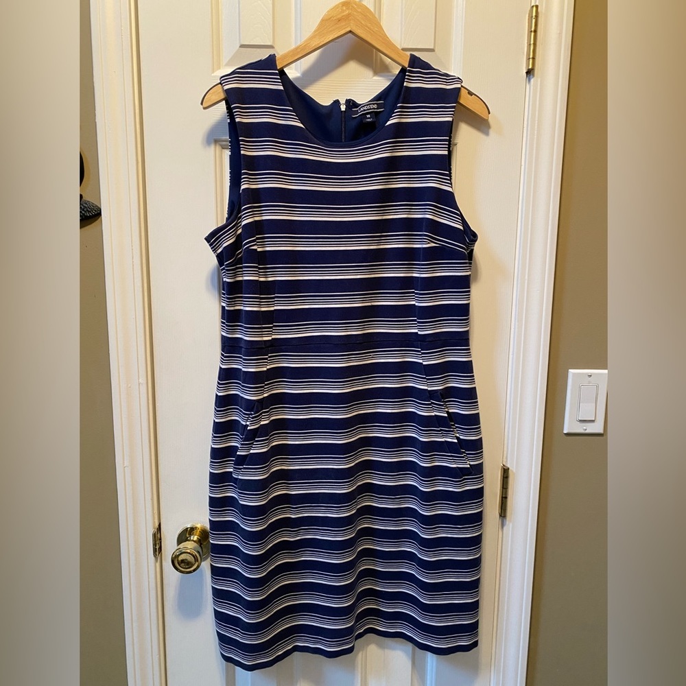 Lands’end blue/white stripe dress with front pockets. Size 16